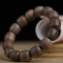 Load image into Gallery viewer, Wild Agarwood Bracelet from Cambodia 99% sinking grade Kynam 12mm Beads