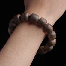 Load image into Gallery viewer, Wild Agarwood Bracelet from Cambodia 99% sinking grade Kynam 12mm Beads