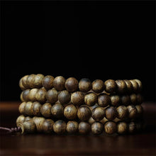 Load image into Gallery viewer, Green Kynam Wild Oud Agarwood Bracelet from Nha Trang Vietnam 8mm Diameter Beads
