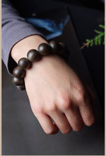 Load image into Gallery viewer, Wild Agarwood Bracelet from Kalimantan Indonesia 14mm Diameter Beads Genuine Agarwood
